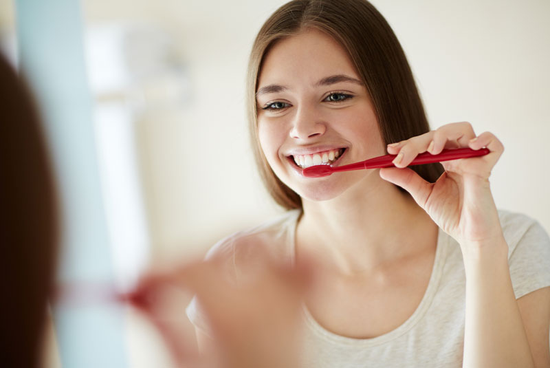 dental patient brushing teeth Pittsfield, MA